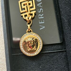 Authentic VERSACE Medusa  bracelet . Gold plated with stones